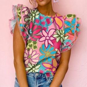 Gorgeous boutique floral ruffle sleeve blouse
